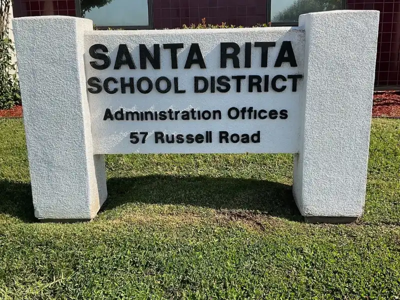 A sign that says santa rita school district.