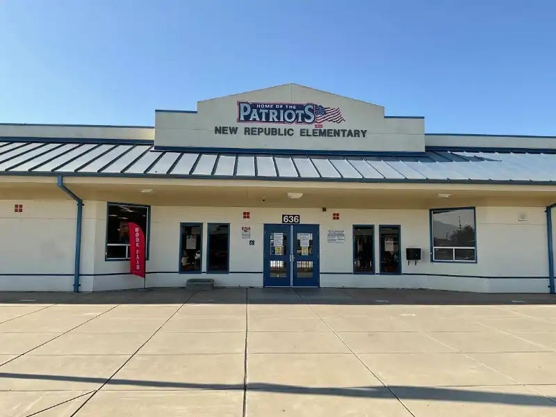 A building with a large sign on the front of it.